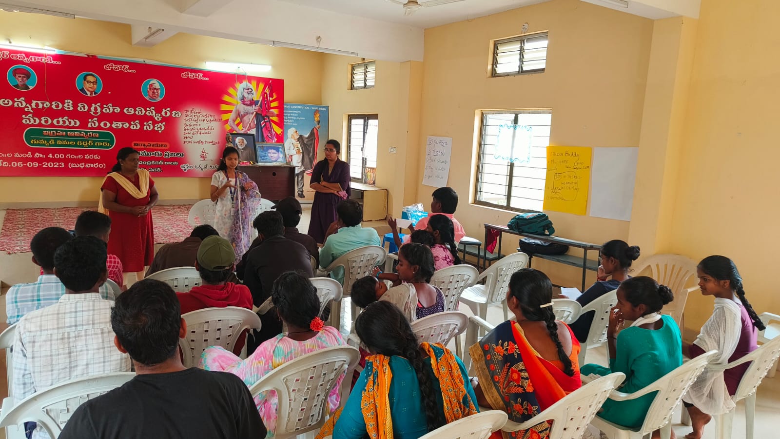 Photo showing explanation of water supply observation form etc to participants at Yadamma Nagar